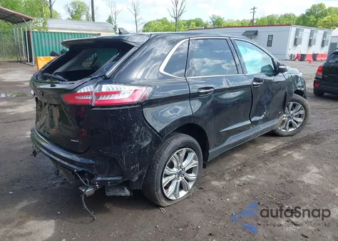 2022 Ford Edge Titanium z USA, uszkodzony, nr VIN 2FMPK4K95NBA45450